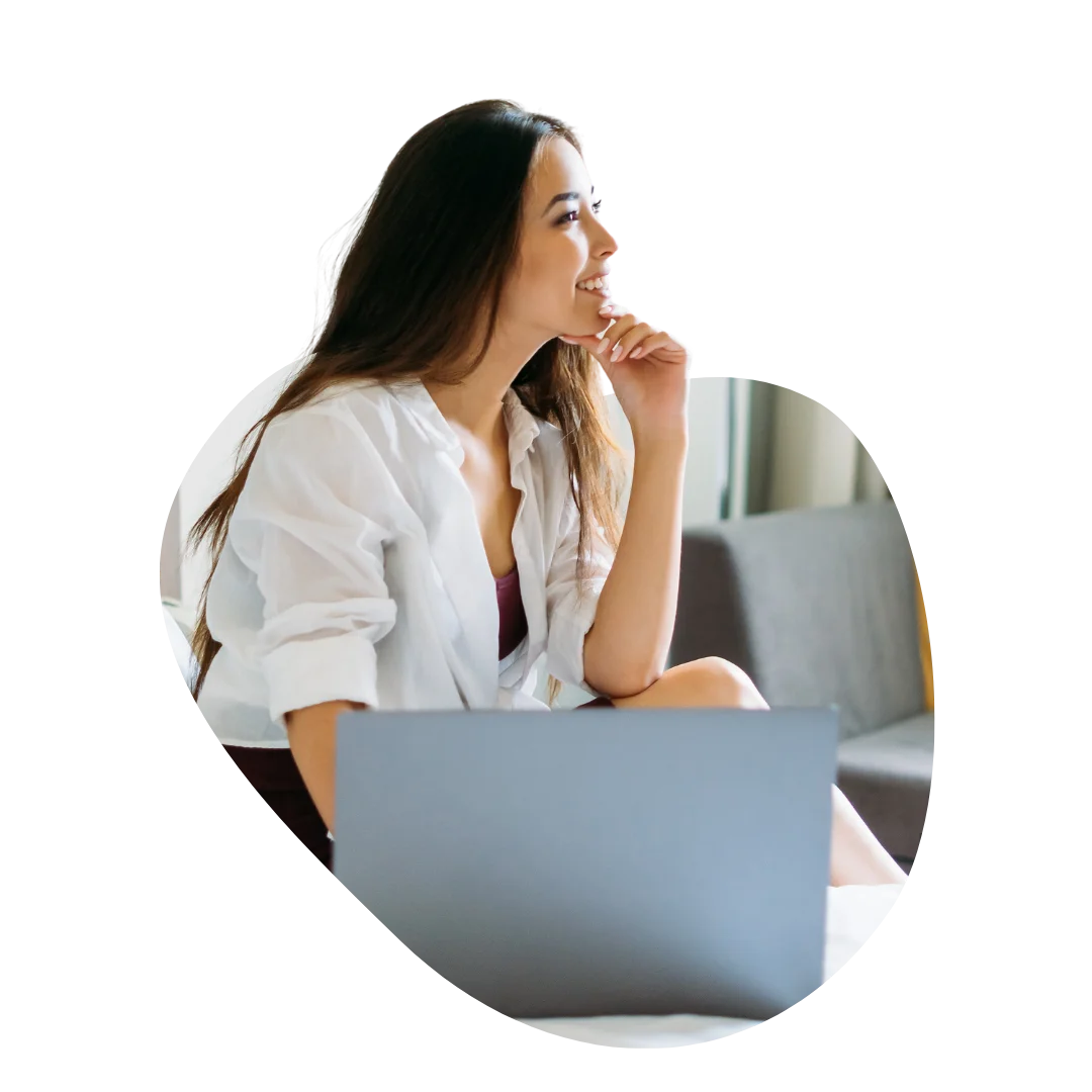 Hotel team member reviewing unified guest intelligence on laptop
